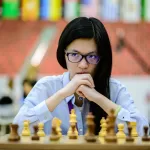 Top 100 chess players - Hou Yifan Playing Chess